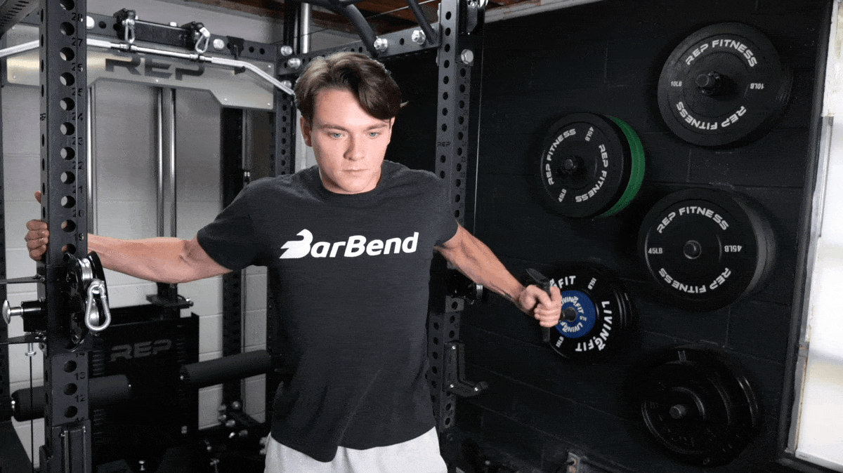 BarBend's Jake Herod performing the cable press-around exercise.
