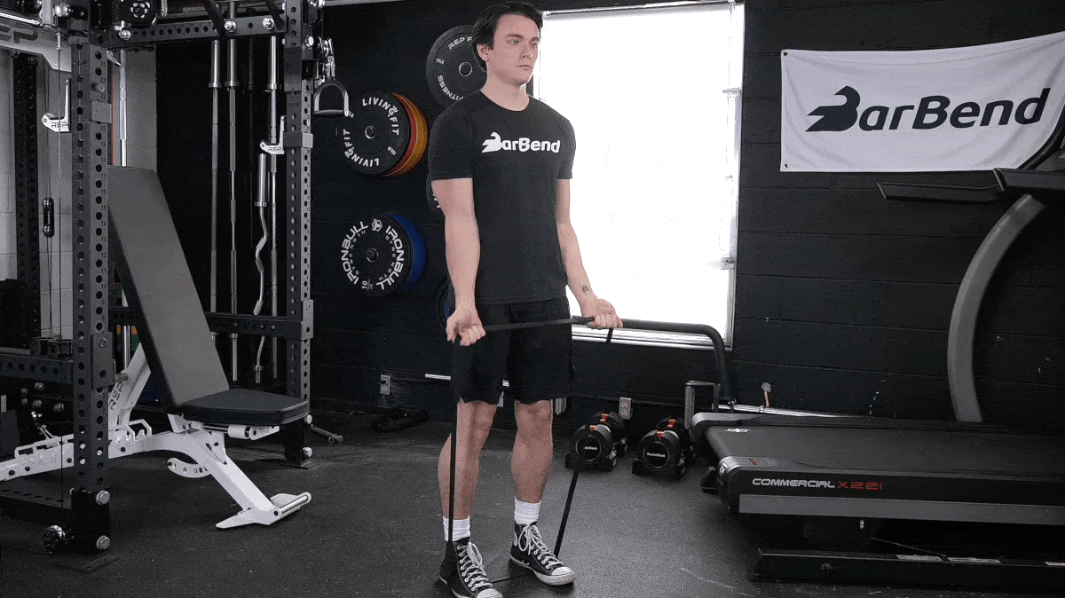 BarBend's Jake Herod performing the resistance band curl.