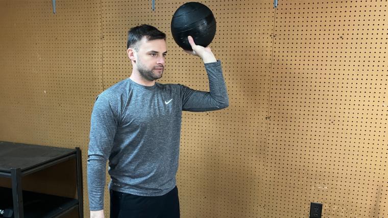 BarBend reviews writer Matt Cummings with the Fringe Sport Slam Ball.