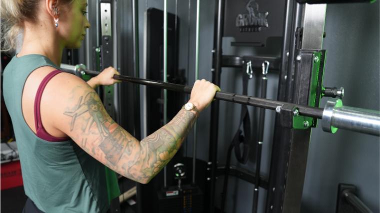 Our tester using the Gronk Fitness Functional Trainer.