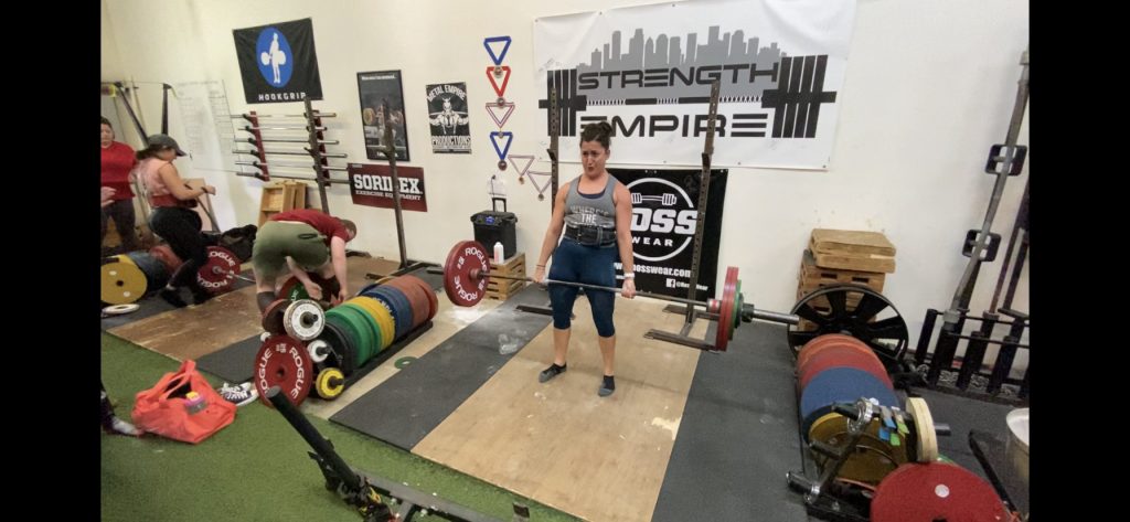 Kate using Rogue calibrated steel plates.